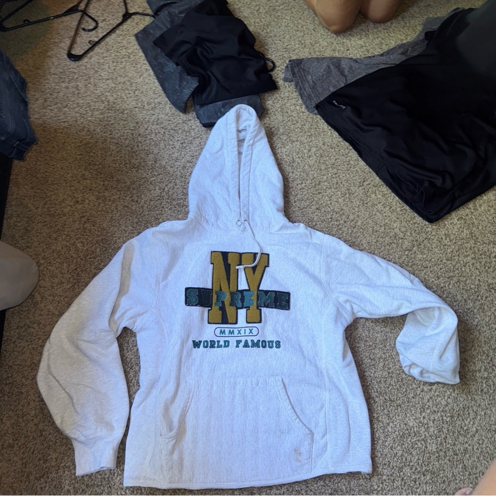 Supreme Gray Hoodie with Red Tag